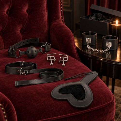 BDSM-kit för viderkomna med munkavle, bröstvårtsklämmor, halsband, paddel och handfängsel – stämningsbild (AI-genererad bild)